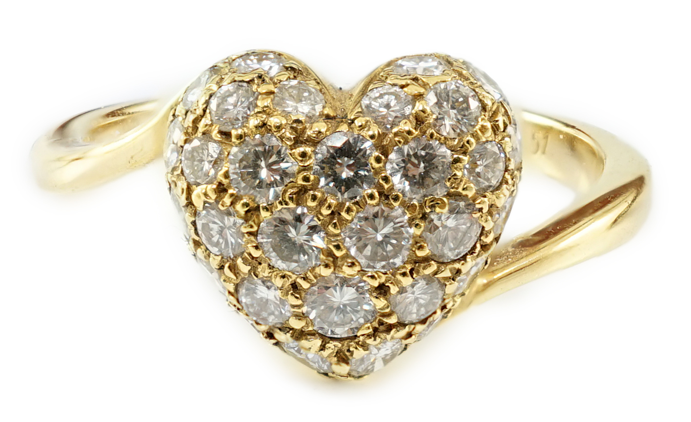 A modern Cartier 18ct gold and pave set diamond heart shaped ring